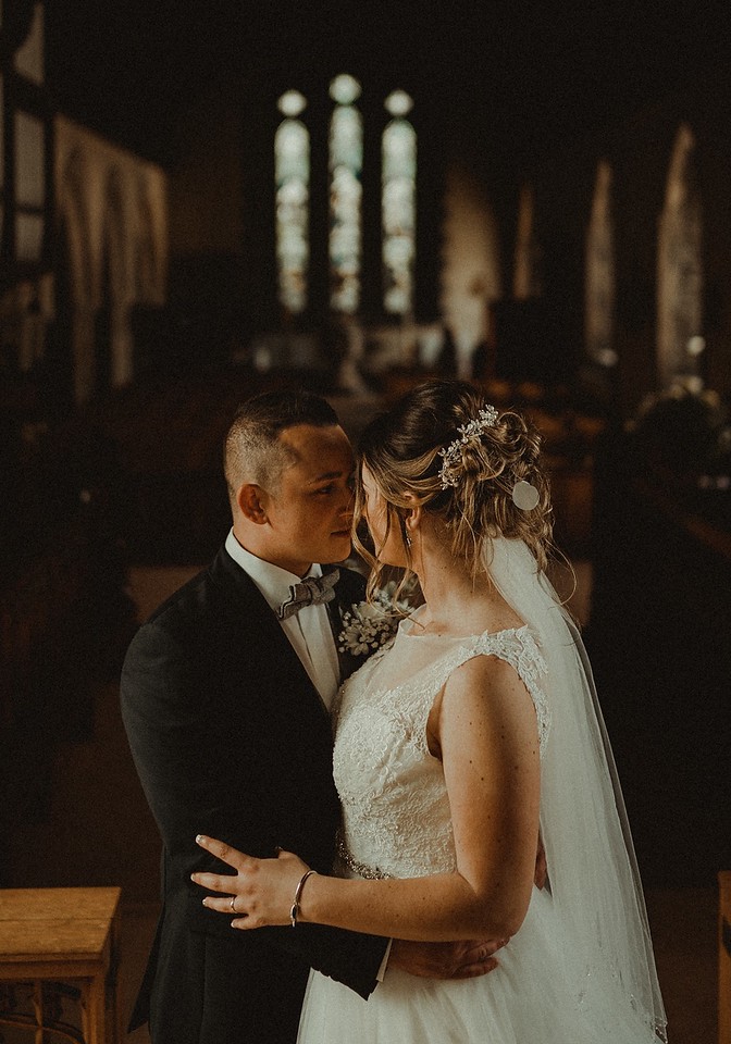 bride and groom in a church