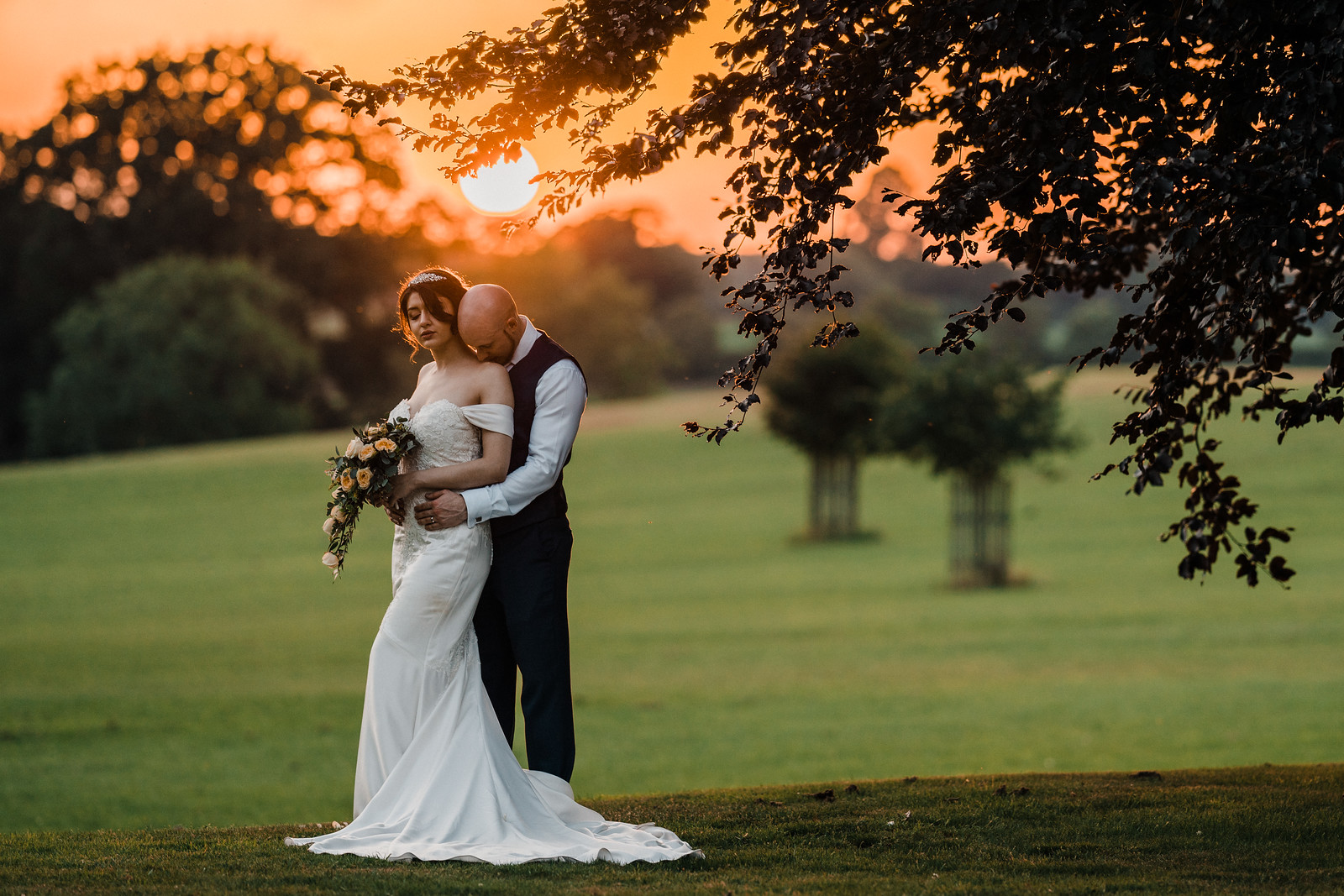 Bride and groom sunset wedding photo