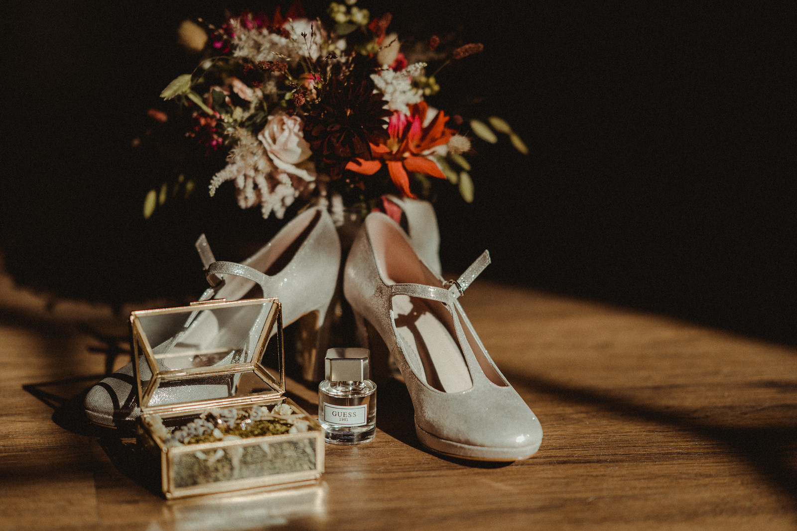 Brides wedding shoes and wedding flowers