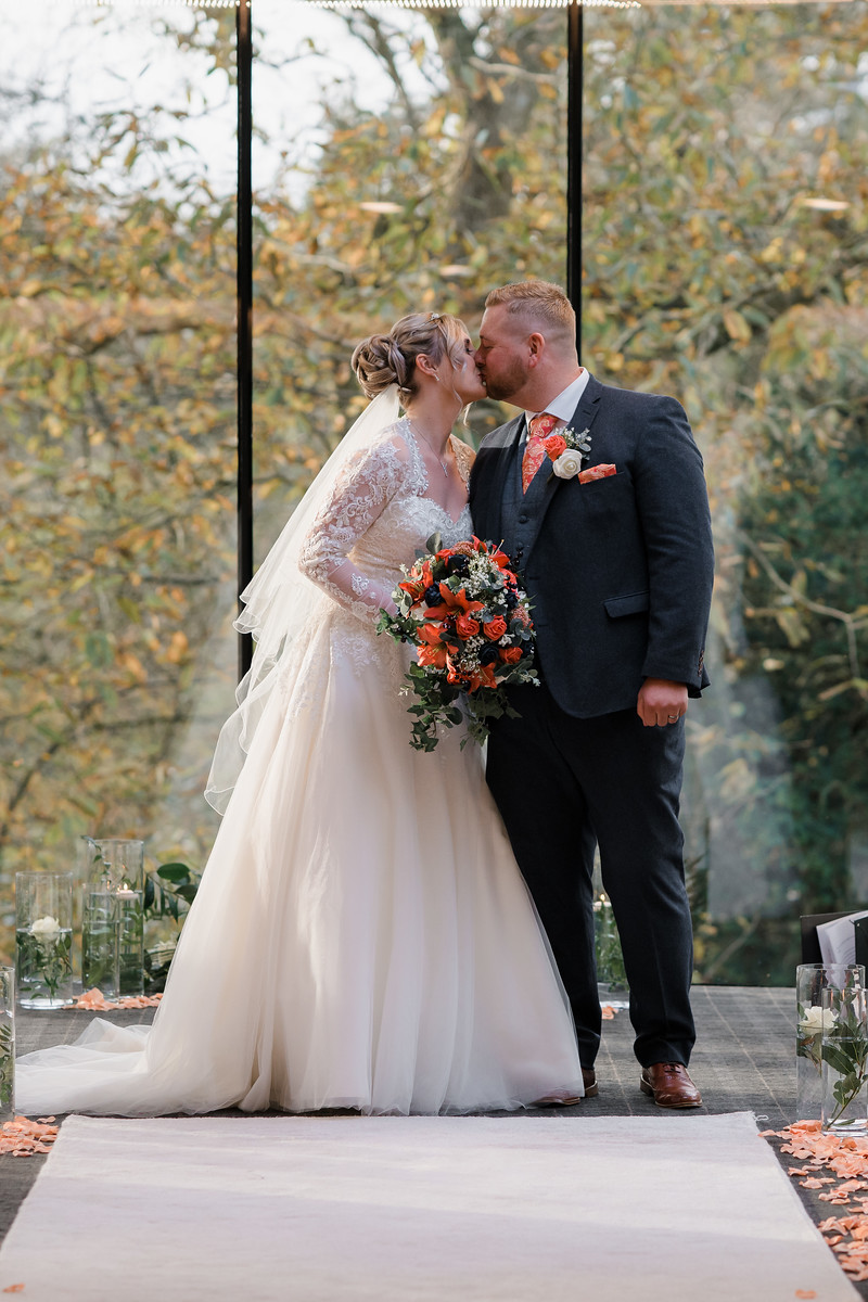First kiss as husband and wife wedding photo