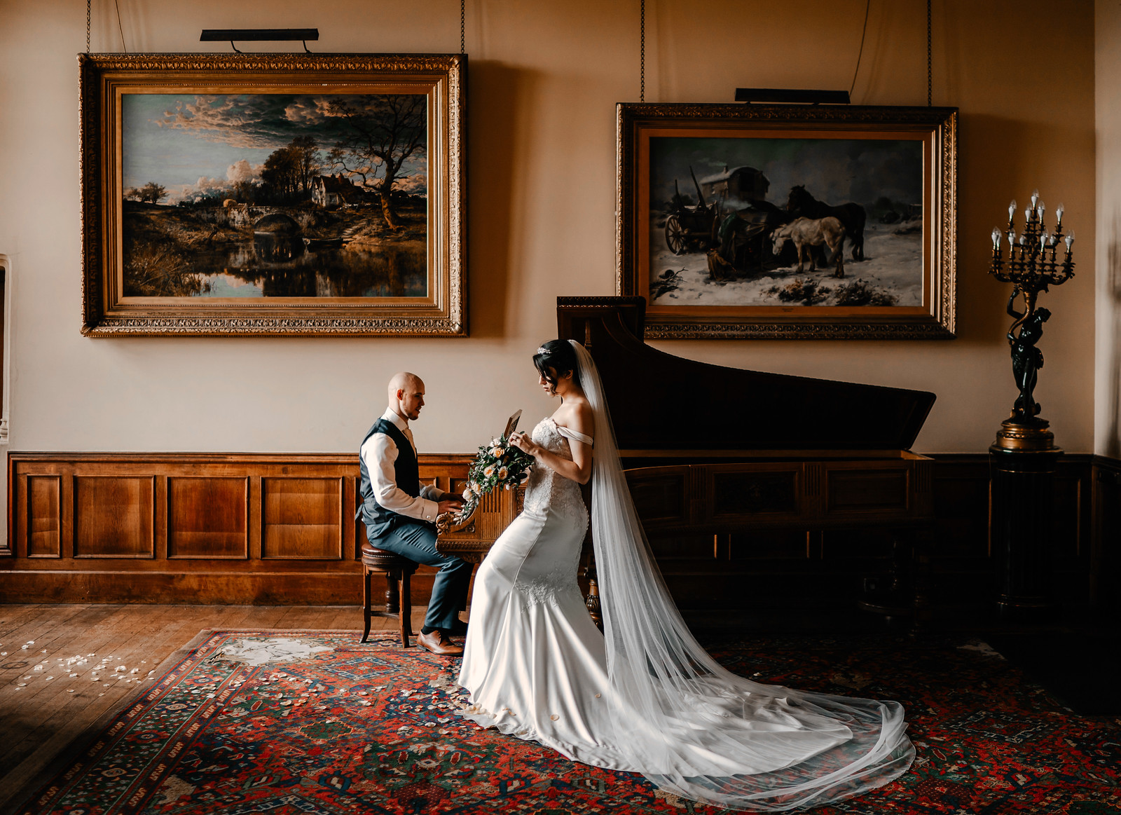 Bride and groom by a grand piano